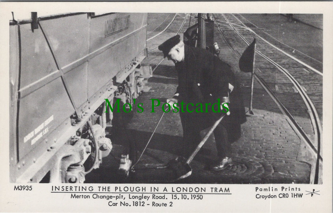 London Postcard - Inserting The Plough in a London Tram SW11746