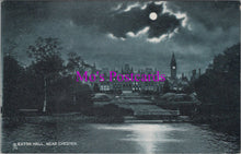 Load image into Gallery viewer, Vintage black and white postcard of Eaton Hall near Chester under a moonlit sky.
