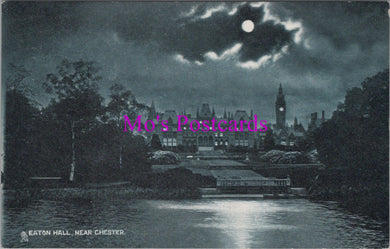 Vintage black and white postcard of Eaton Hall near Chester under a moonlit sky.