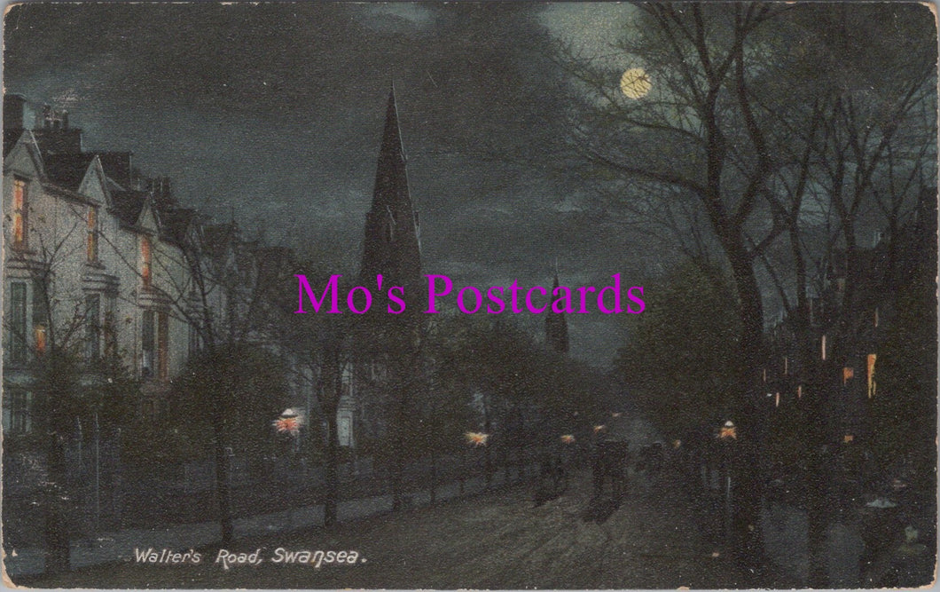 Vintage night scene of a street with buildings and a church spire, labeled 'Mo's Postcards'.