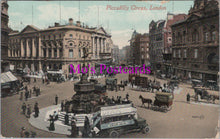 Load image into Gallery viewer, Vintage postcard of Piccadilly Circus, London with people and vehicles around a statue.
