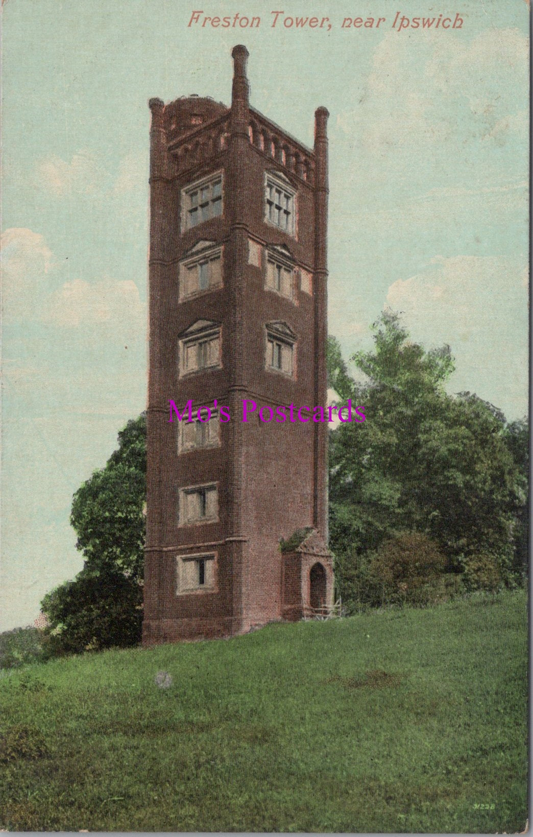 Vintage postcard of a tower with 'Max's Postcards' branding.