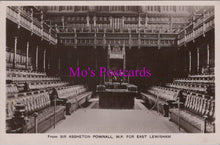 Load image into Gallery viewer, Vintage black and white photo of a large room with rows of chairs and a podium, labeled &#39;Mo&#39;s Postcards&#39;.
