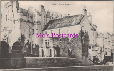 Vintage black and white photo of Crathes Castle with 'Mo's Postcards' text overlay.