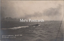 Load image into Gallery viewer, Vintage black and white postcard of a ship in action during the Battle of Jutland 
