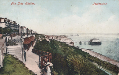 Vintage postcard of Folkestone with a view of the sea and pier.
