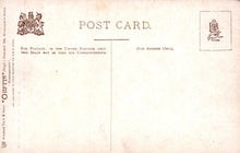 Load image into Gallery viewer, Back of a vintage postcard with British coat of arms and text
