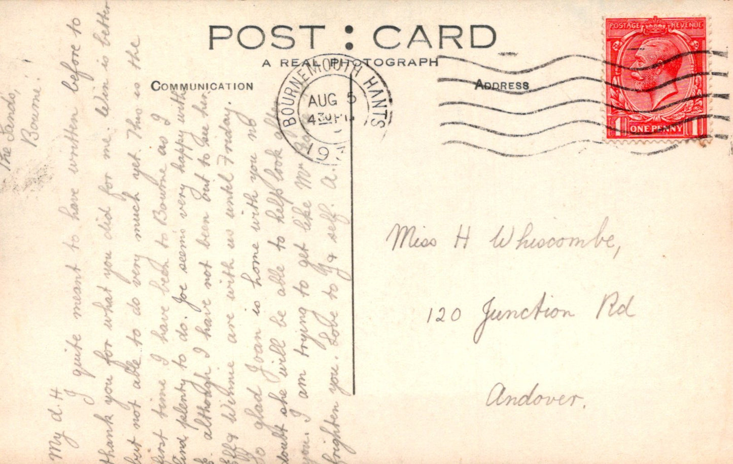 Vintage postcard with handwritten text, postage stamp, and postmark.