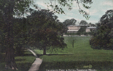 Vintage postcard of Calverley Park & Hotel in Tunbridge Wells with trees and a path.