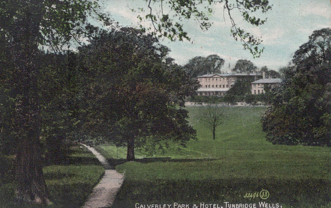 Vintage postcard of Calverley Park & Hotel in Tunbridge Wells with trees and a path.