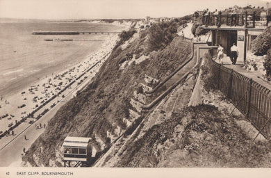 Vintage black and white photo of East Cliff in Bournemouth with a coastal view.