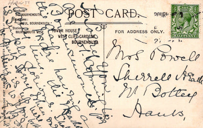 Vintage postcard with handwritten text and a stamp, featuring the sender's address and recipient's name.
