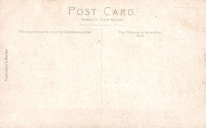 Vintage postcard with text and a textured background