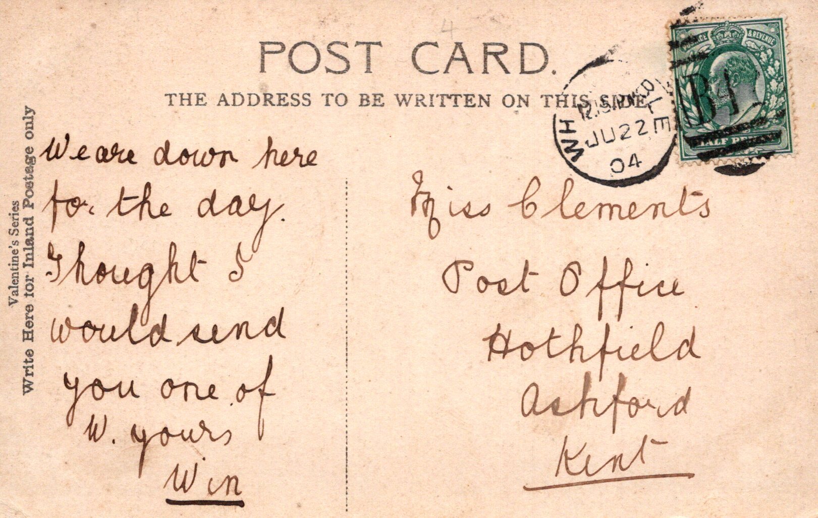 Vintage postcard with handwritten text and a stamp, featuring a beige background.