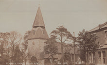 Load image into Gallery viewer, Vintage photograph of a church with a tall spire and surrounding trees.
