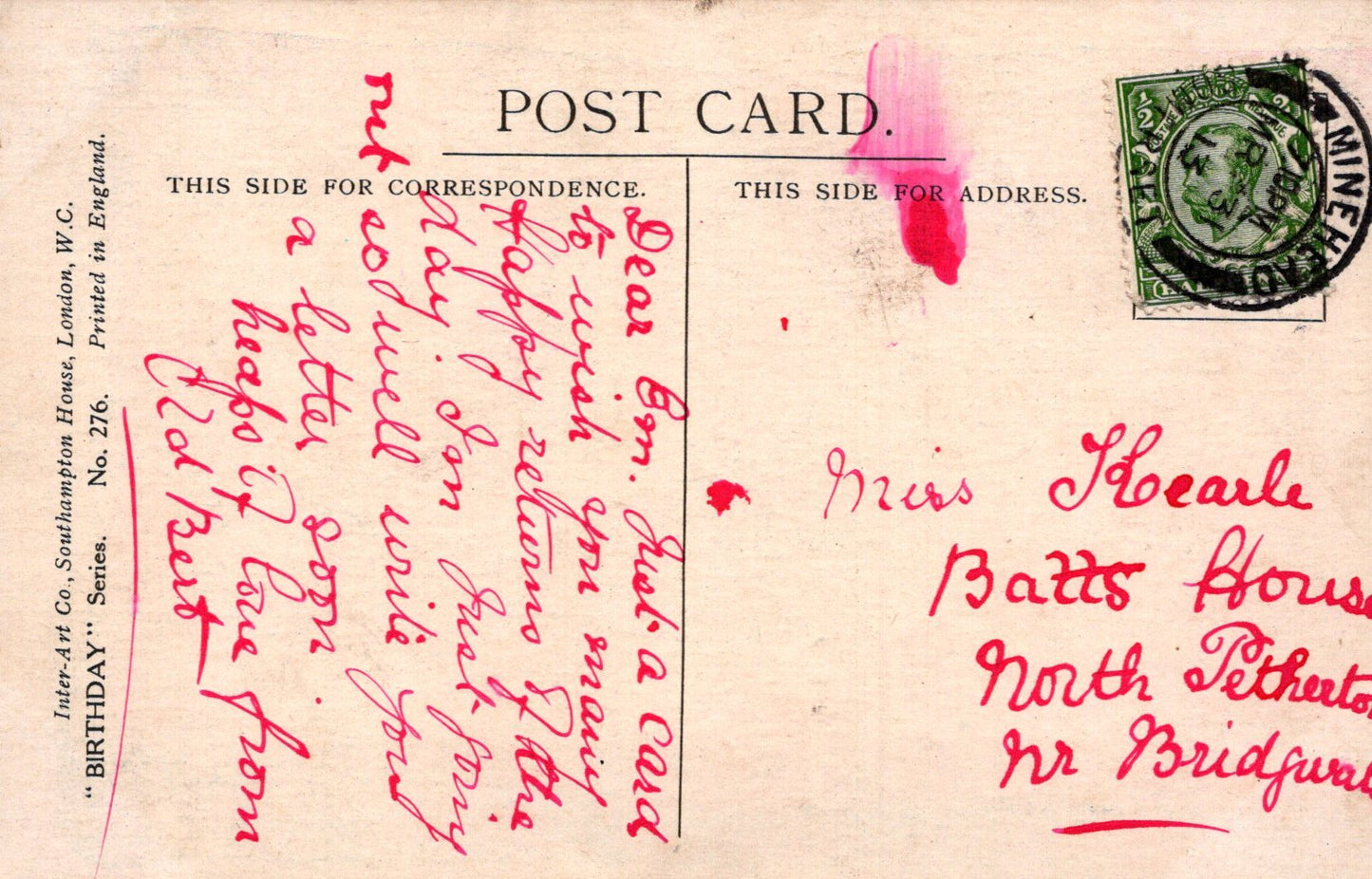 Vintage postcard with handwritten text and a stamp, featuring a red ink stamp on the right side.