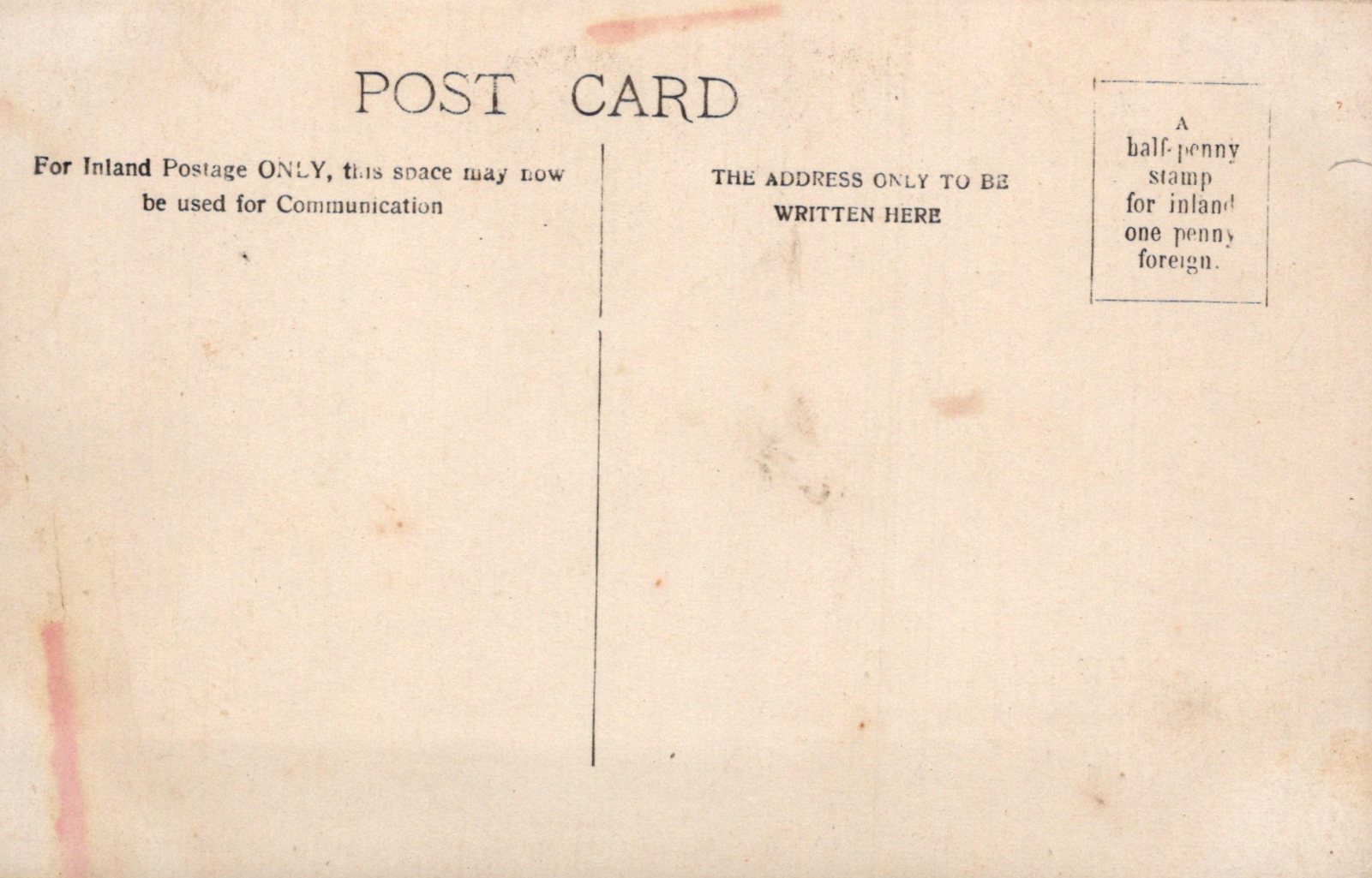 Vintage postcard with text and stamps on a beige background