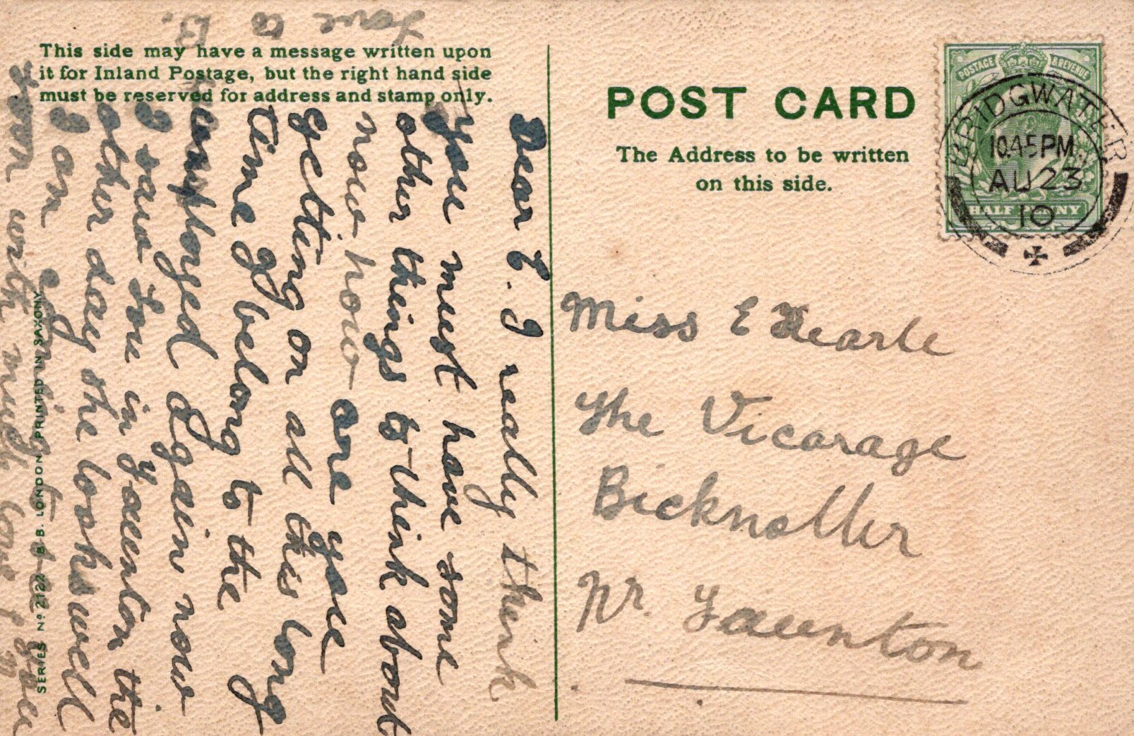 Vintage postcard with handwritten text and a stamp, featuring a message and address on a beige background.