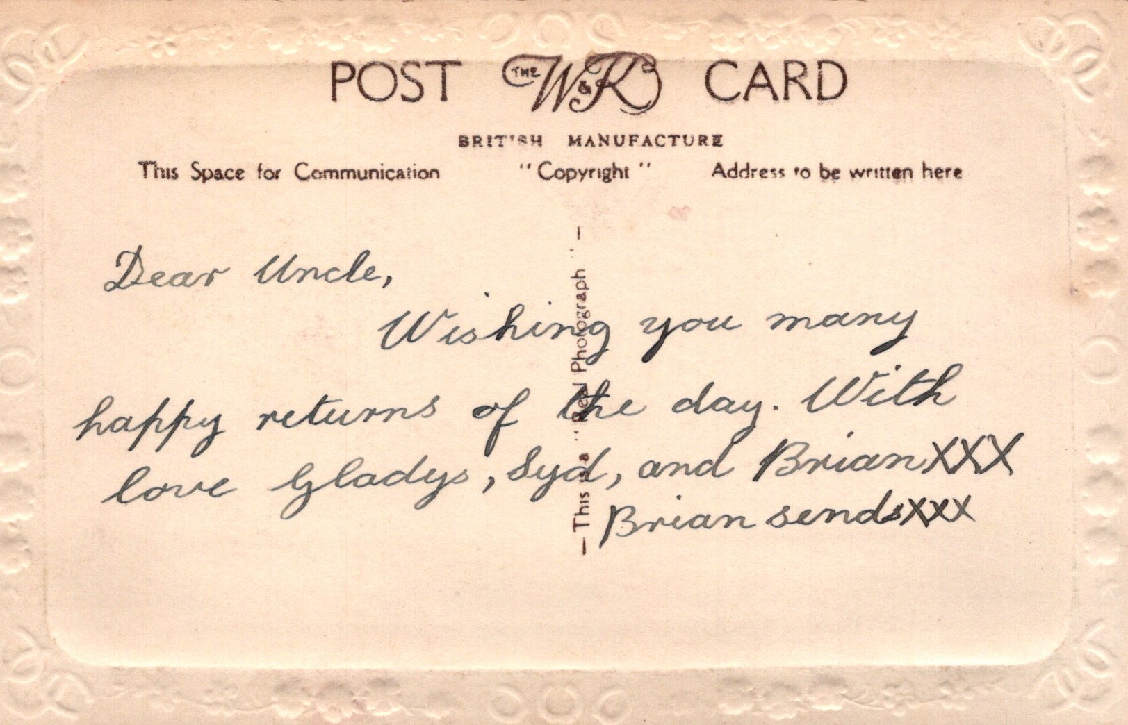 Vintage postcard with handwritten message on a beige background