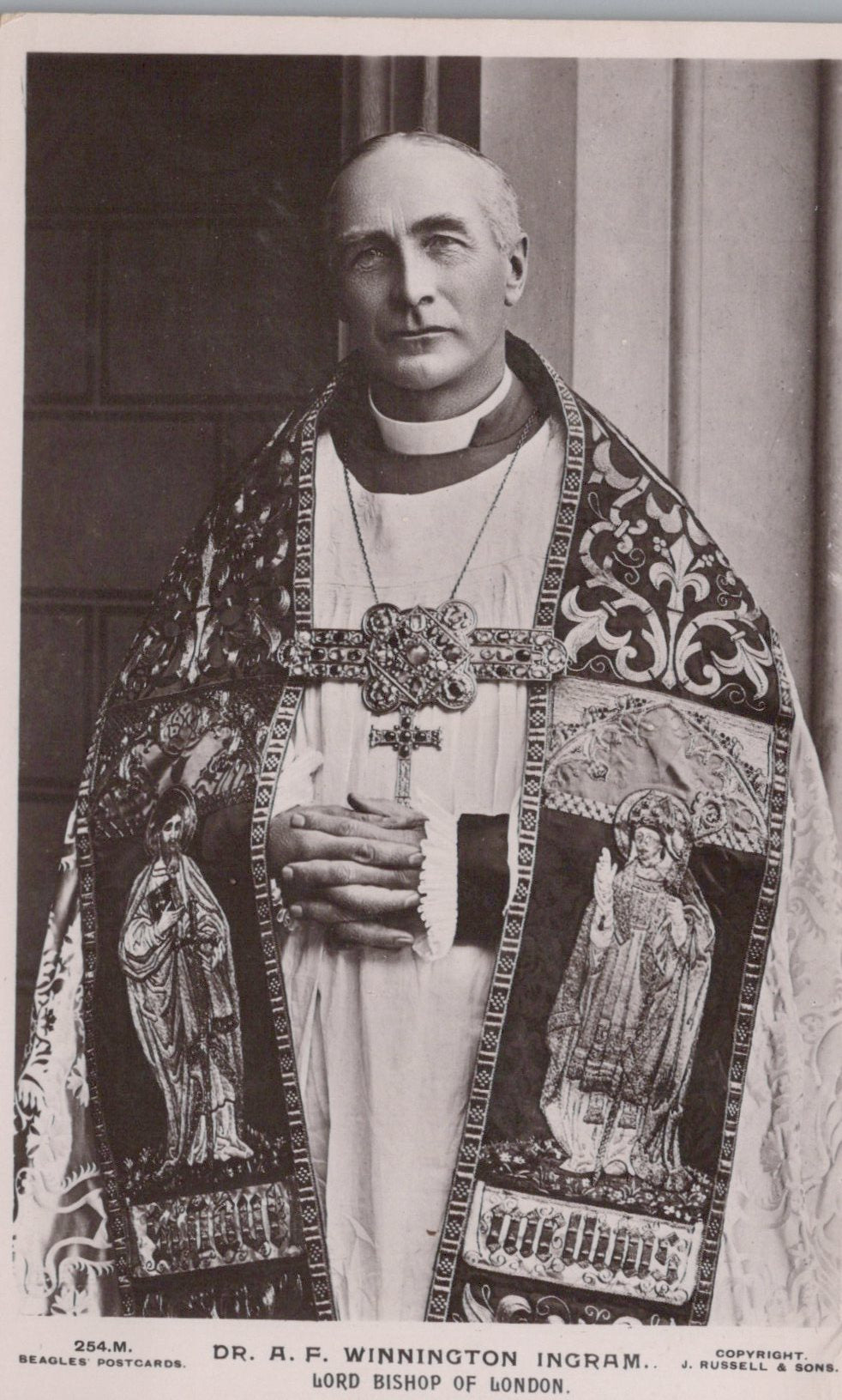 Black and white photograph of a person in religious vestments with decorative front panel.