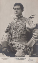 Load image into Gallery viewer, Vintage black and white photograph of a person in formal attire with decorative elements.
