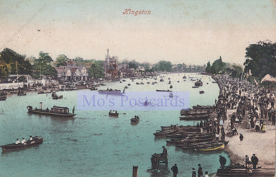 Vintage postcard of a bustling waterfront scene with boats and people, likely from the early 20th century.