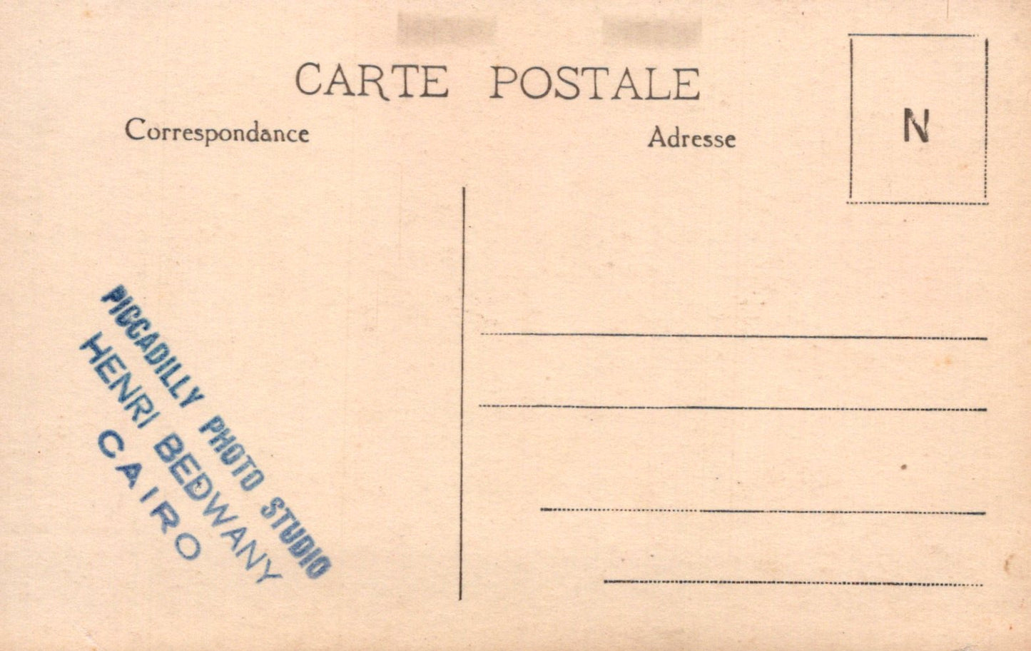 Back of a vintage postcard with text and a logo, featuring 'Piggadilly Photo Studio Henri Bedwany Cairo'.