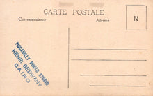 Load image into Gallery viewer, Back of a vintage postcard with text and a logo, featuring &#39;Piggadilly Photo Studio Henri Bedwany Cairo&#39;.
