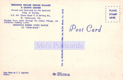 Back of a postcard from Seminole Okalee Indian Village & Crafts Center with text and branding.