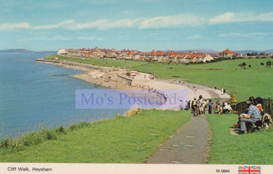 Cliff Walk in Heysham with people on a path by the sea