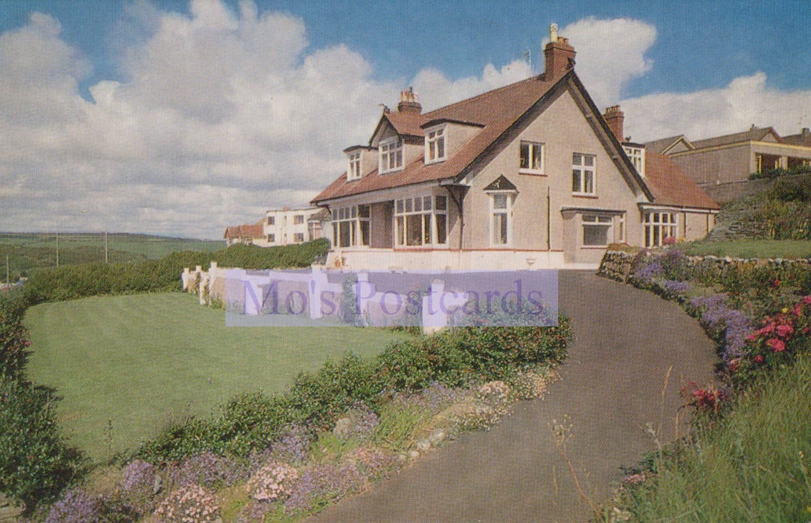 Stylized image of a house with a purple overlay and 'Moss Postcards' branding.