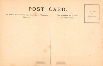 Vintage postcard with text and a line dividing the front and back