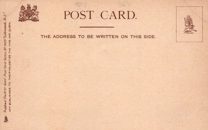 Vintage postcard with text and stamps on a beige background
