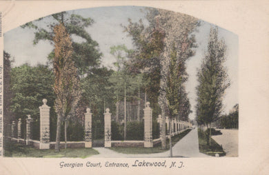 Vintage postcard of a garden entrance with trees and a path, labeled 'Georgian Court, Entrance, Lakewood, N.J.'