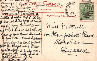 Vintage postcard with handwritten text and postage stamp, featuring the word 'Postcard' at the top.