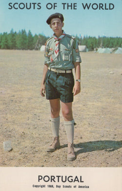 Scout in uniform standing in a field with 'Scouts of the World' and 'Portugal' text at the top.