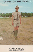 Load image into Gallery viewer, Scout in uniform standing in a field with &#39;Scouts of the World&#39; and &#39;Costa Rica&#39; text at the bottom.

