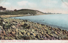 Load image into Gallery viewer, Vintage postcard of East Beach at Watch Hill, Rhode Island with rocky shoreline and distant buildings.
