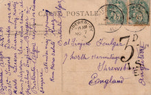 Load image into Gallery viewer, Vintage postcard with stamps, postmark, and handwritten text on a brown background
