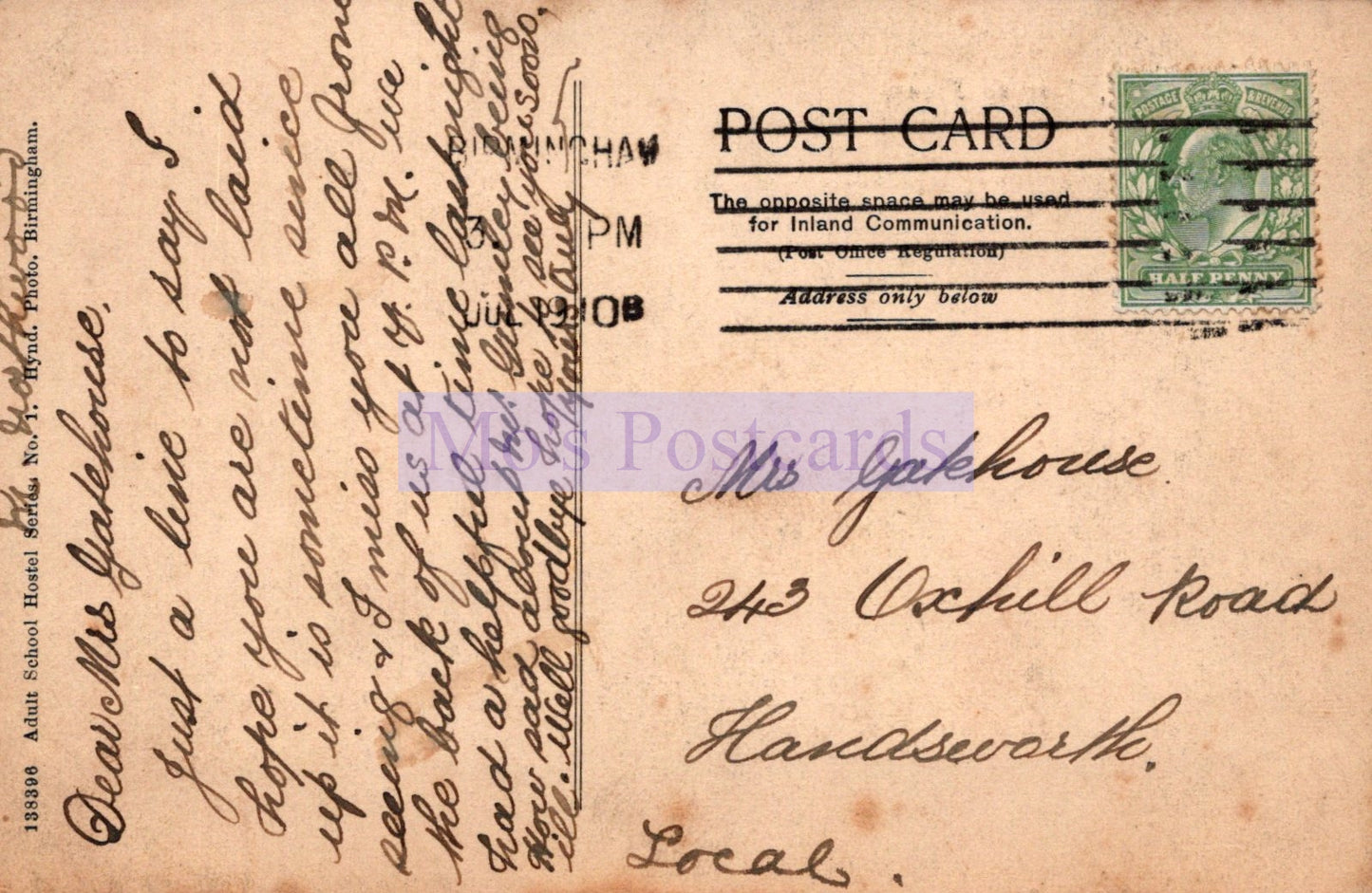 Vintage postcard with text and a stamp on a brown background