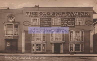 Vintage black and white photo of 'The Old Ship Tavern' building with text on the facade.