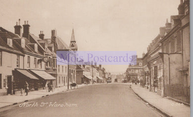 Vintage street scene with buildings and people on a postcard