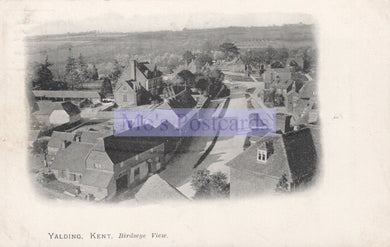 Vintage black and white postcard of Yalding, Kent with a bird's eye view of houses.