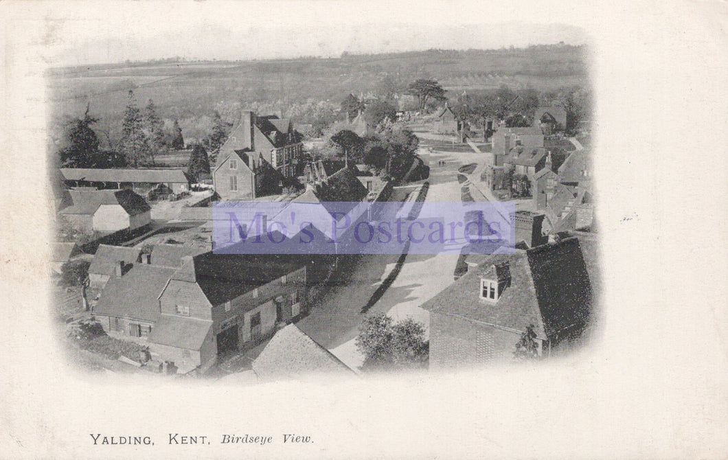 Vintage black and white postcard of Yalding, Kent with a bird's eye view of houses.