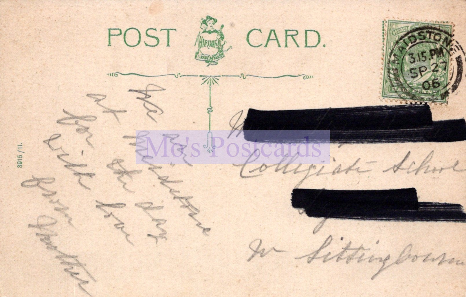 Vintage postcard with handwritten text and a stamp on a beige background