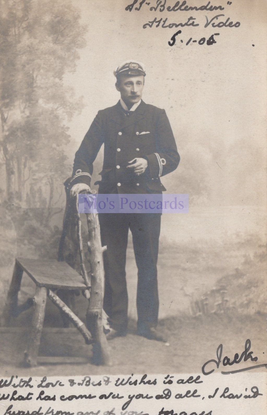 Vintage photograph of a man in uniform holding a rifle with text on a postcard.