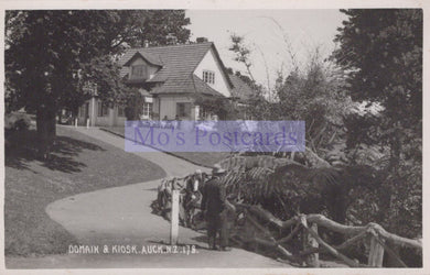 Vintage black and white photo of a house with a person walking a horse, labeled 'Mo's Postcards'.