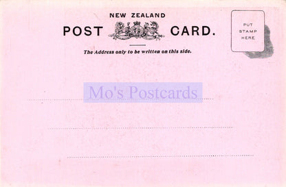 Pink New Zealand postcard with text and a stamp area.