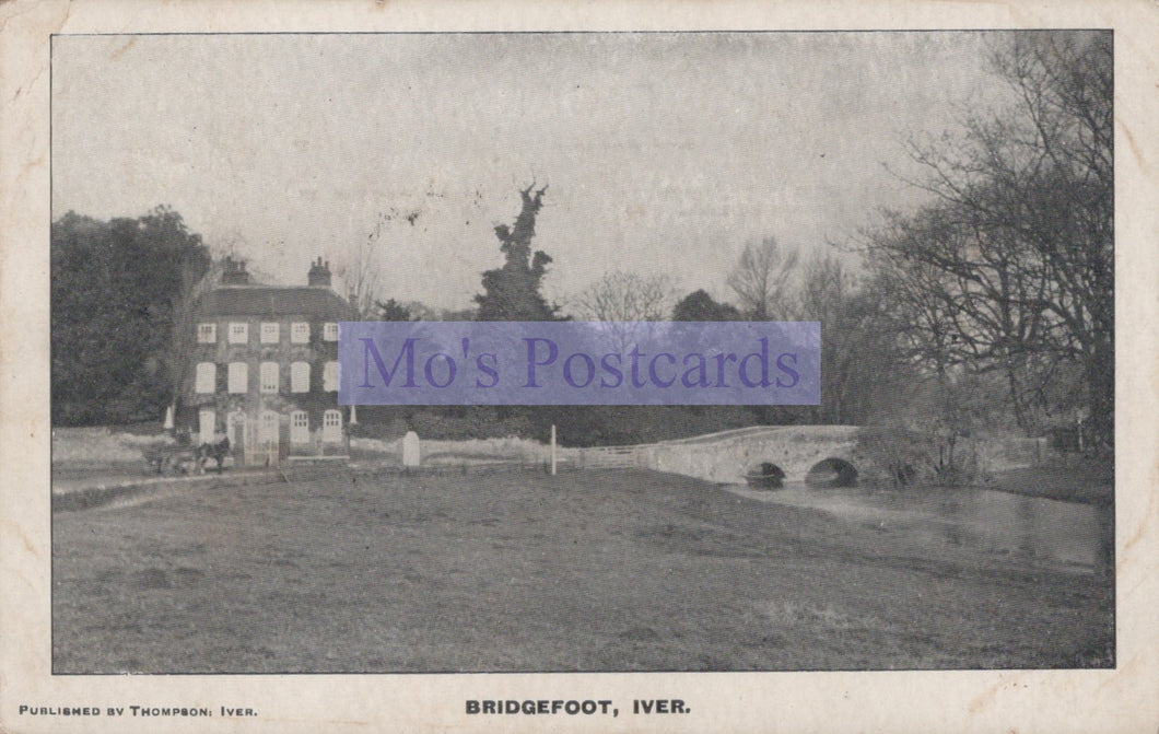 Vintage postcard of a house with a bridge and garden, featuring 'Mo's Postcards' branding.