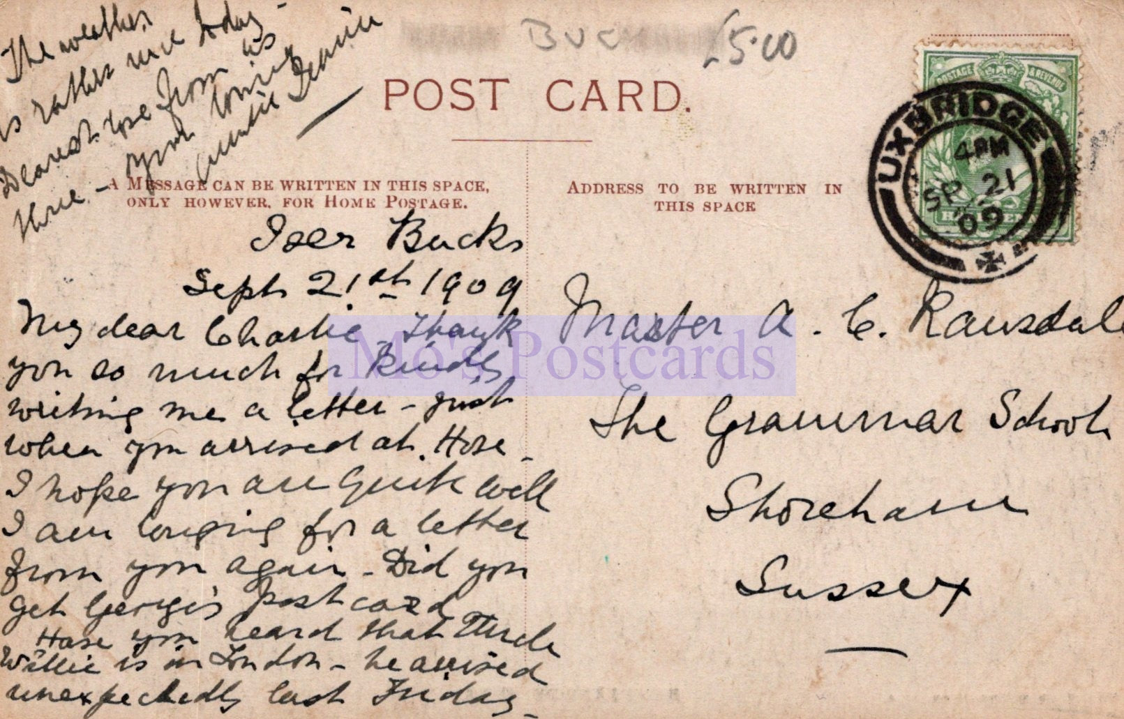 Vintage postcard with handwritten text and a stamp, featuring a message from a student to a teacher.